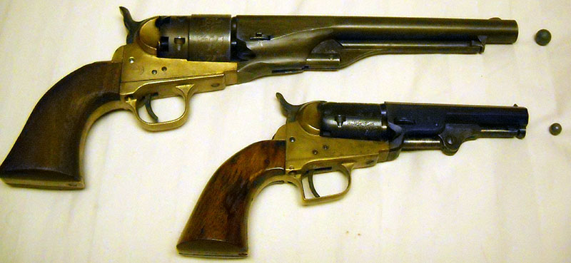 Colt 1849 Pocket and 1951 Navy reproductions, with ammunition